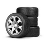 a stack of new car tires